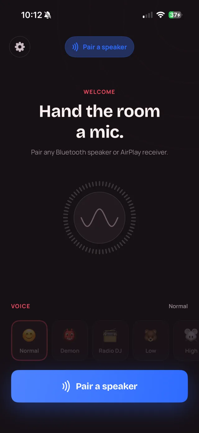 The MyMic welcome screen on an iPhone, reading “Hand the room a mic” with a Pair a speaker button.